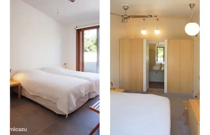 In the master bedroom is a bathroom with shower and double washbins