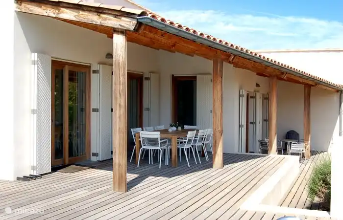 There is a porch at the dining room and a veranda near the living room