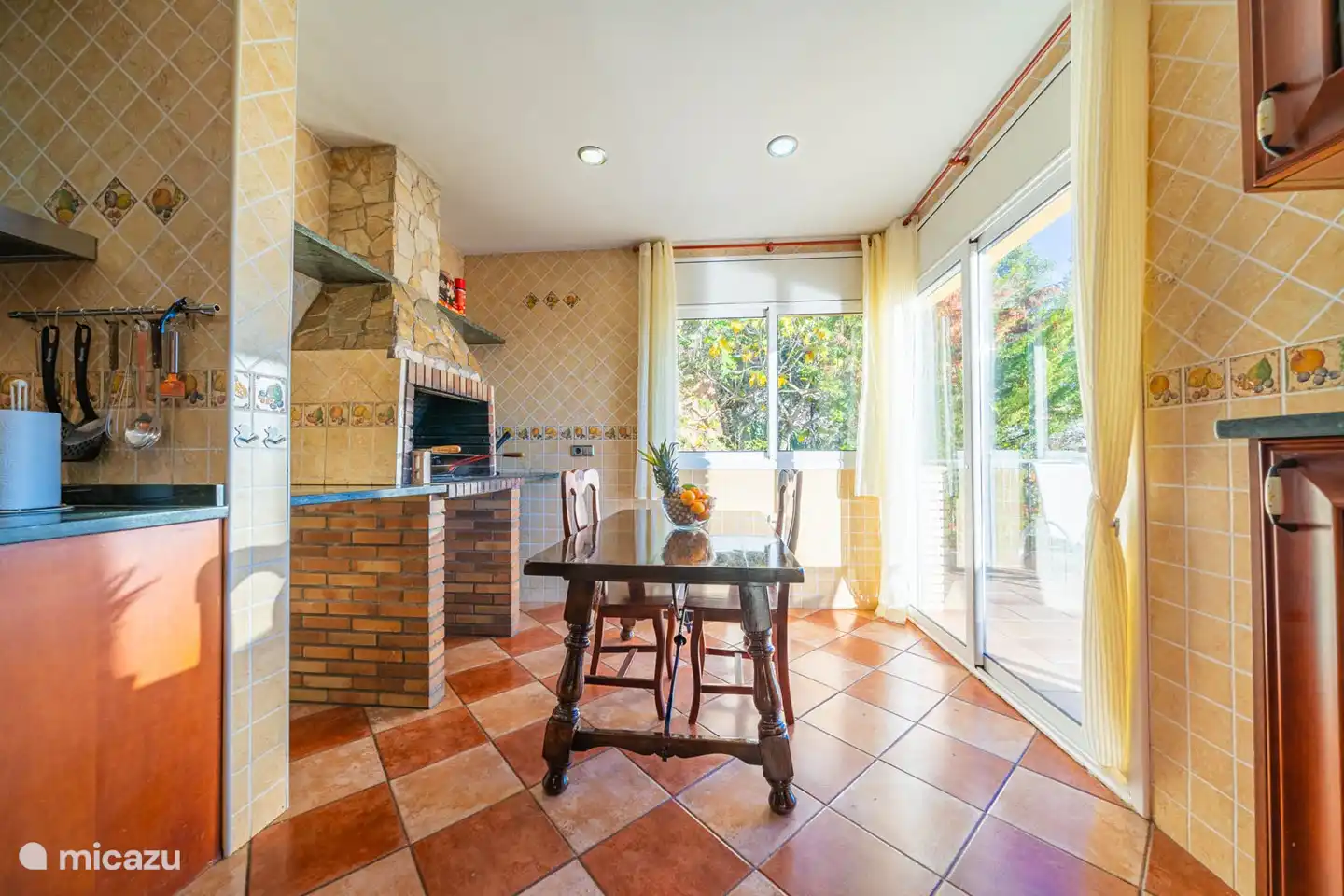 Met schuifdeuren naar het zonneterras