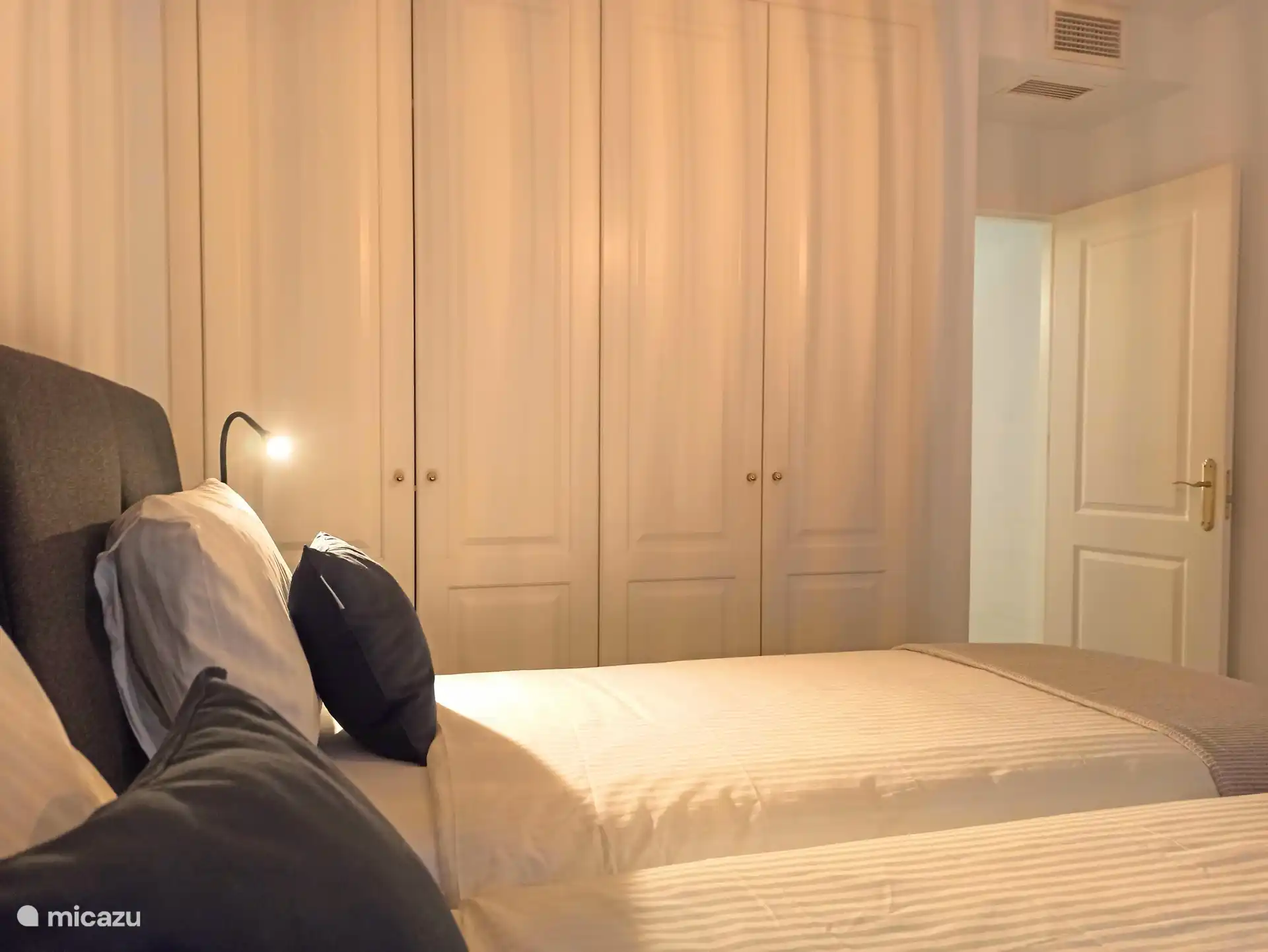 2nd bedroom with storage space for clothes and footwear