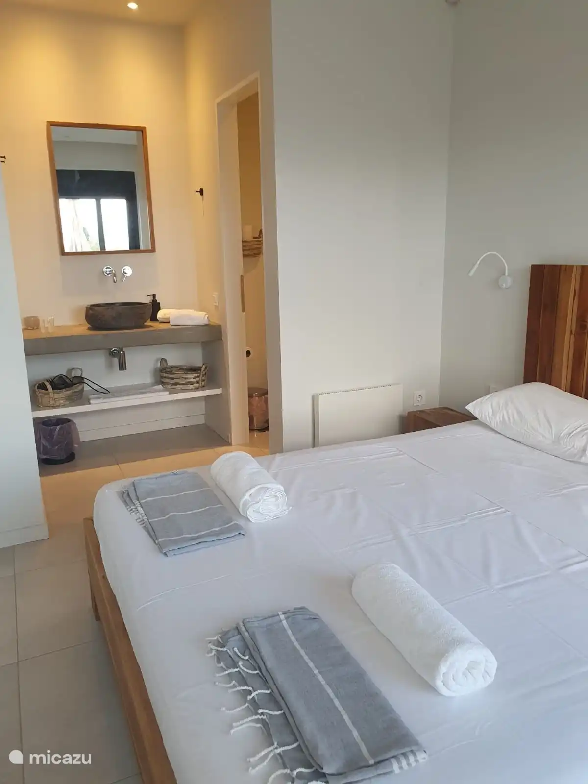 Master bedroom with private shower and toilet.