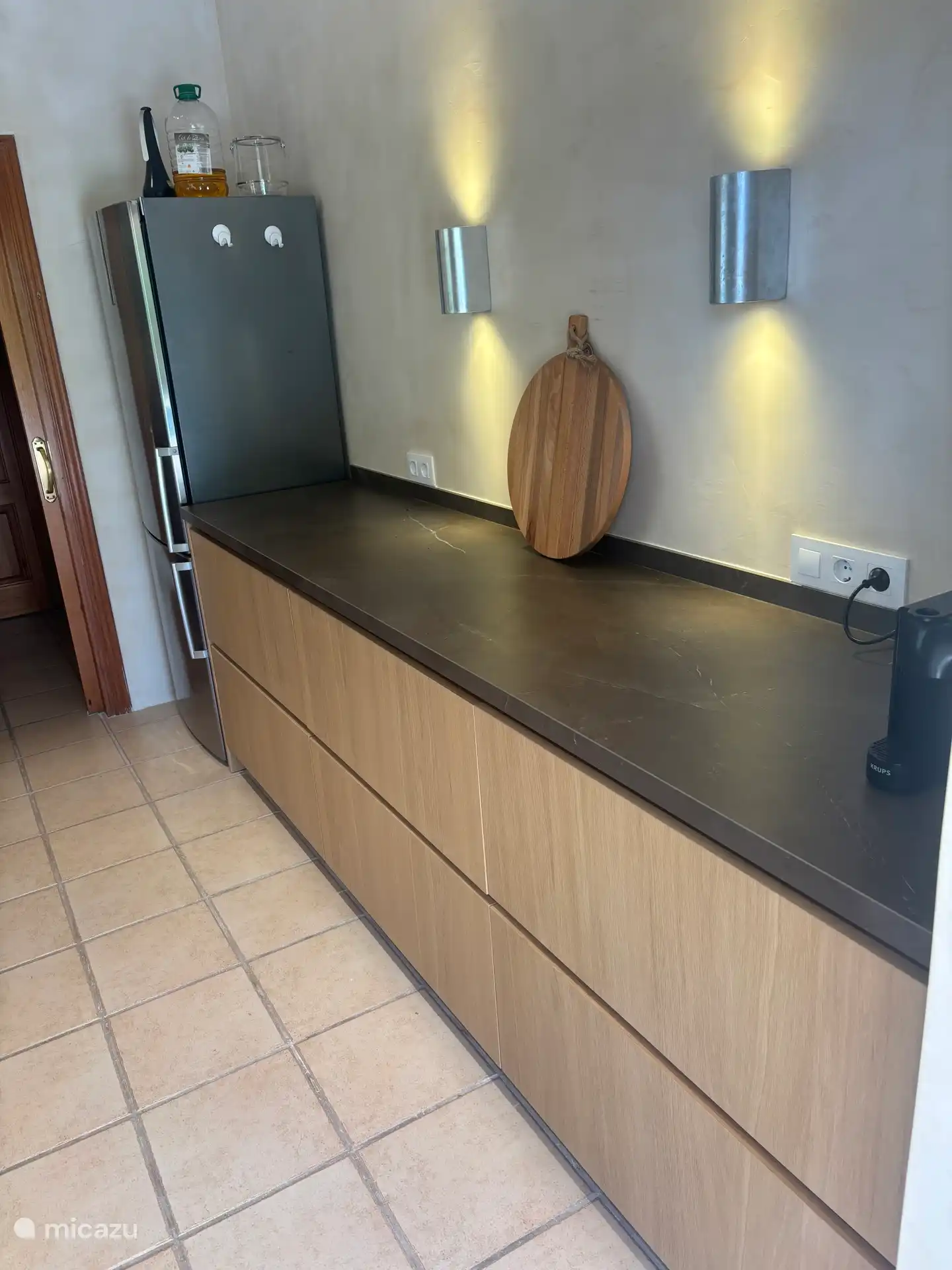 Nespresso and spacious fridge/freezer combination.