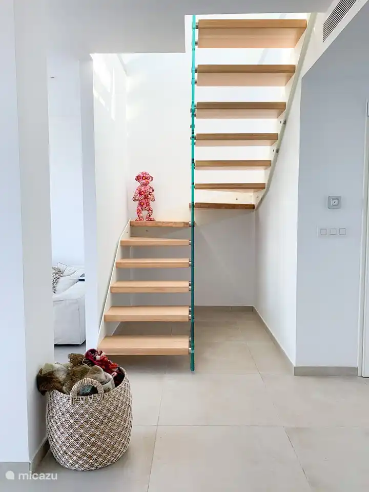 Glass staircase towards deepening