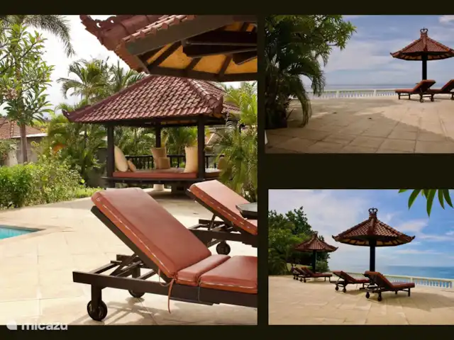 BaliSeaviewVilla Namaste&Guesthouses huren in Indonesië, Bali, Dencarik - villa Er is een ruim terras met zonnebedden en een gazebo om te relaxen en te genieten van het uitzicht.