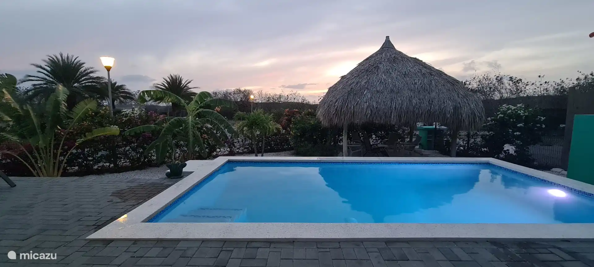 swimming pool at sunset