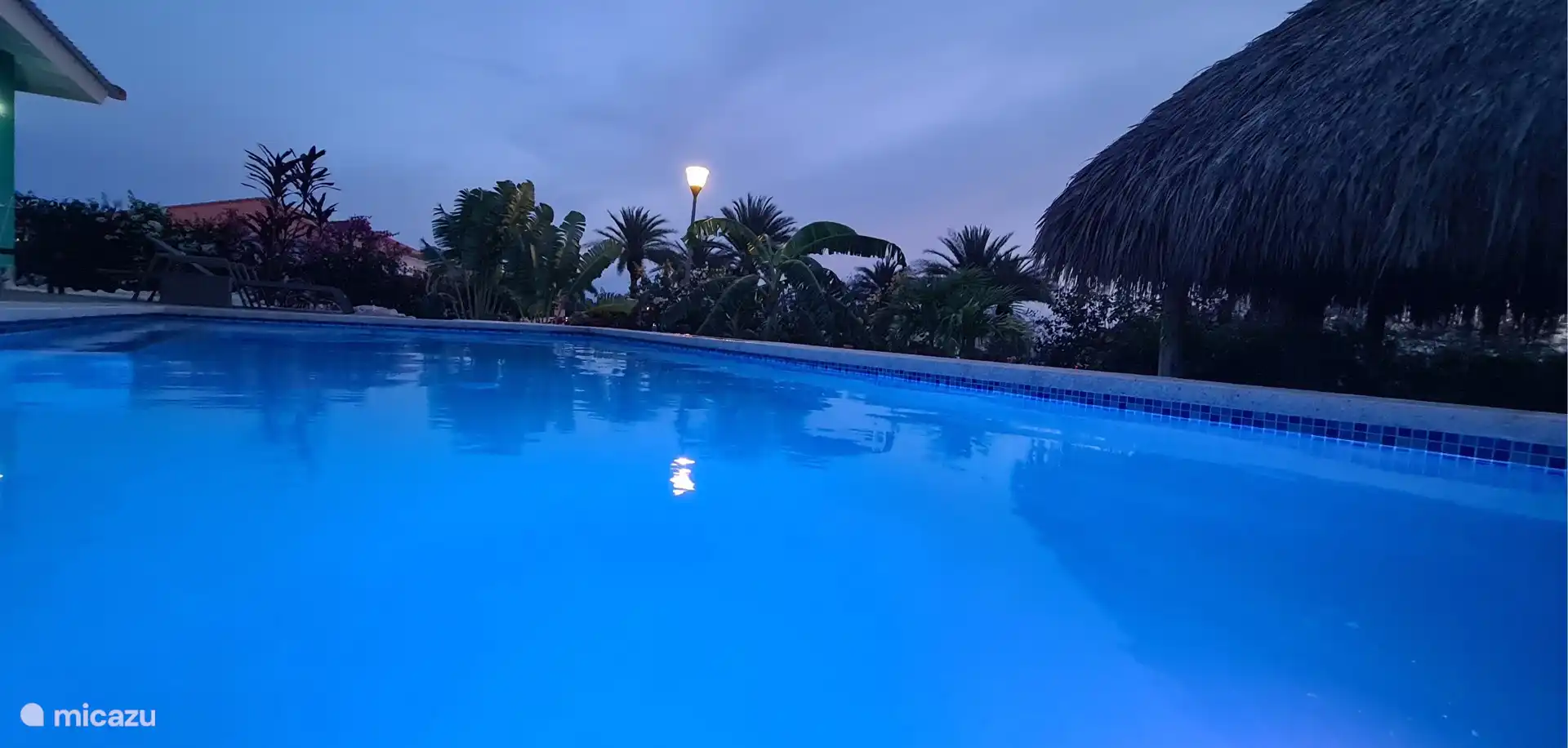 swimming pool at sunset