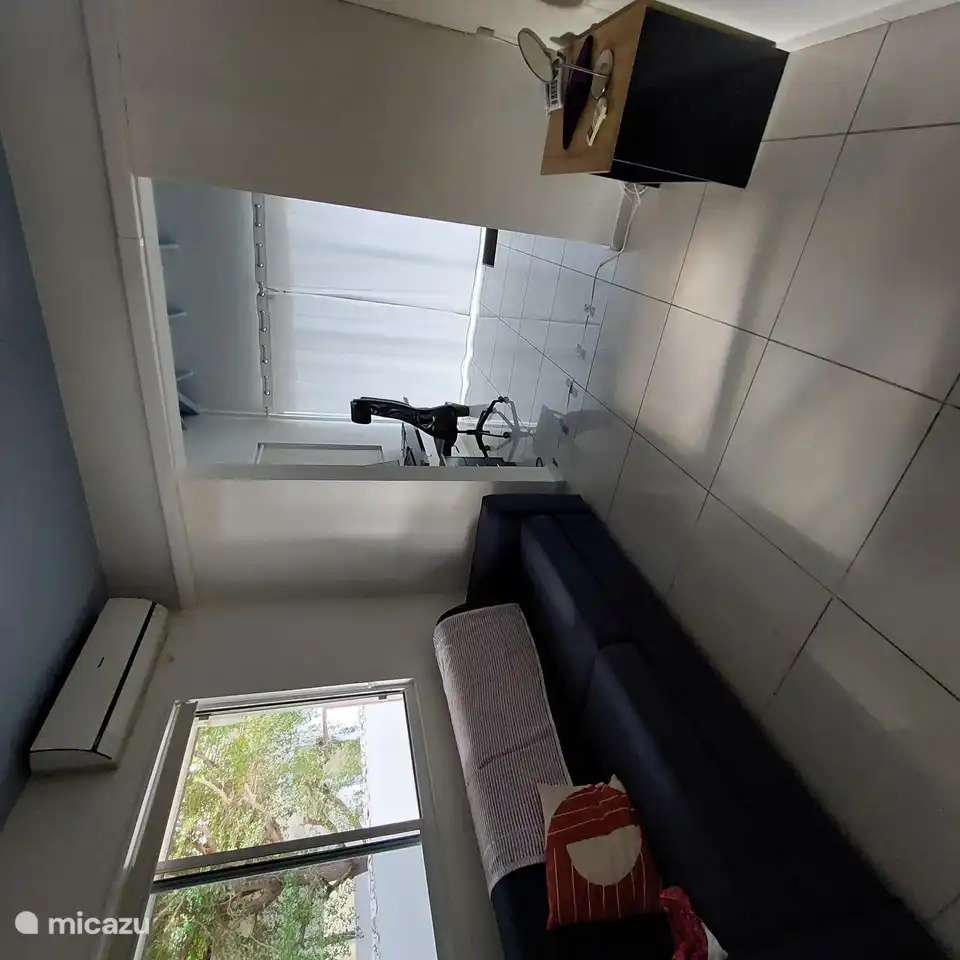 Bedroom 3 (rear) with sofa bed, workplace and laundry room with washing machine