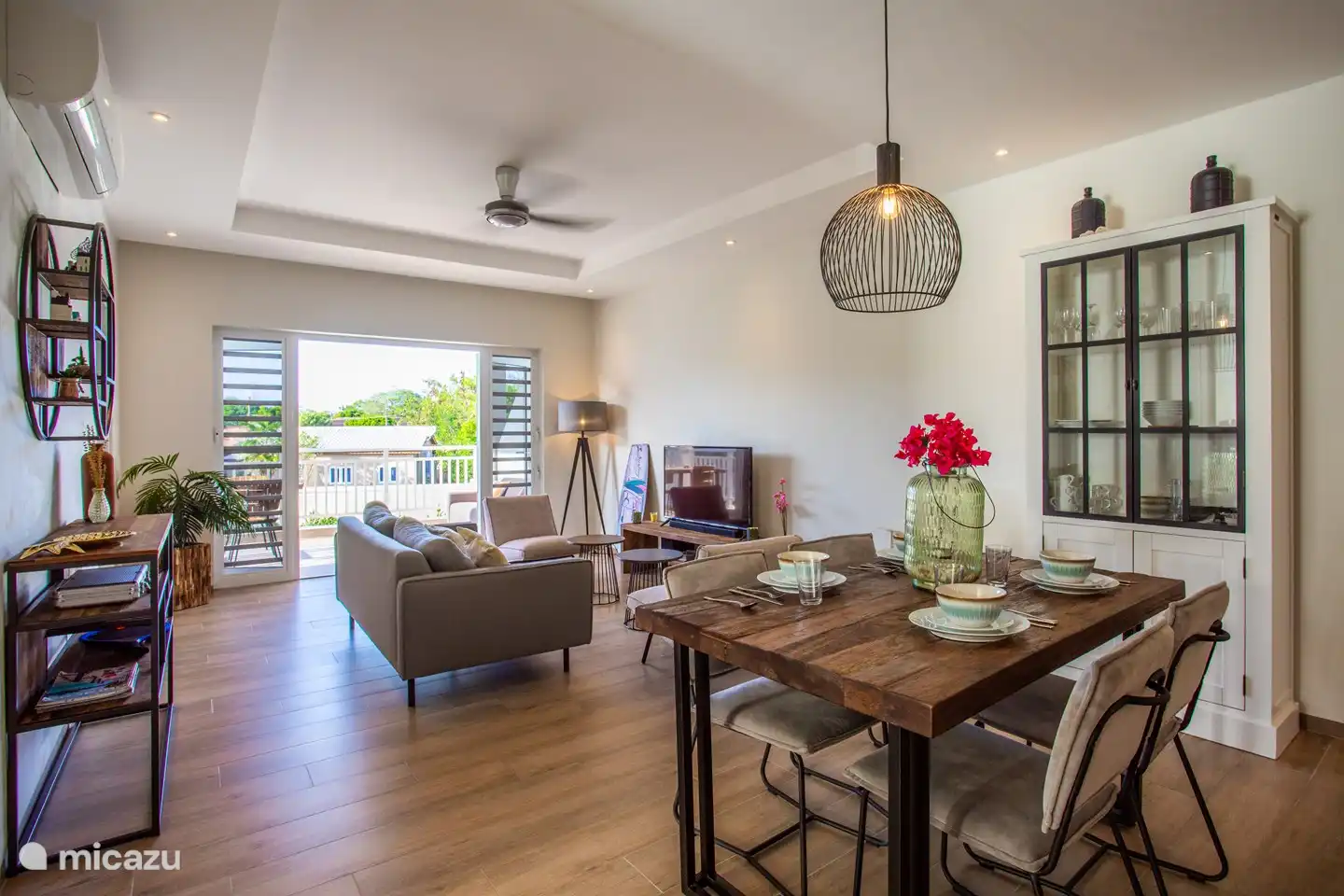 The spacious living room is attractively furnished and fully equipped.