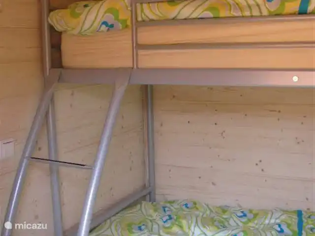 Location de Vacances Italie, Lacs italiens , Porlezza, chalet - Torino 7, Porlezza pétillante Chambre avec un lit double et un lit en haut