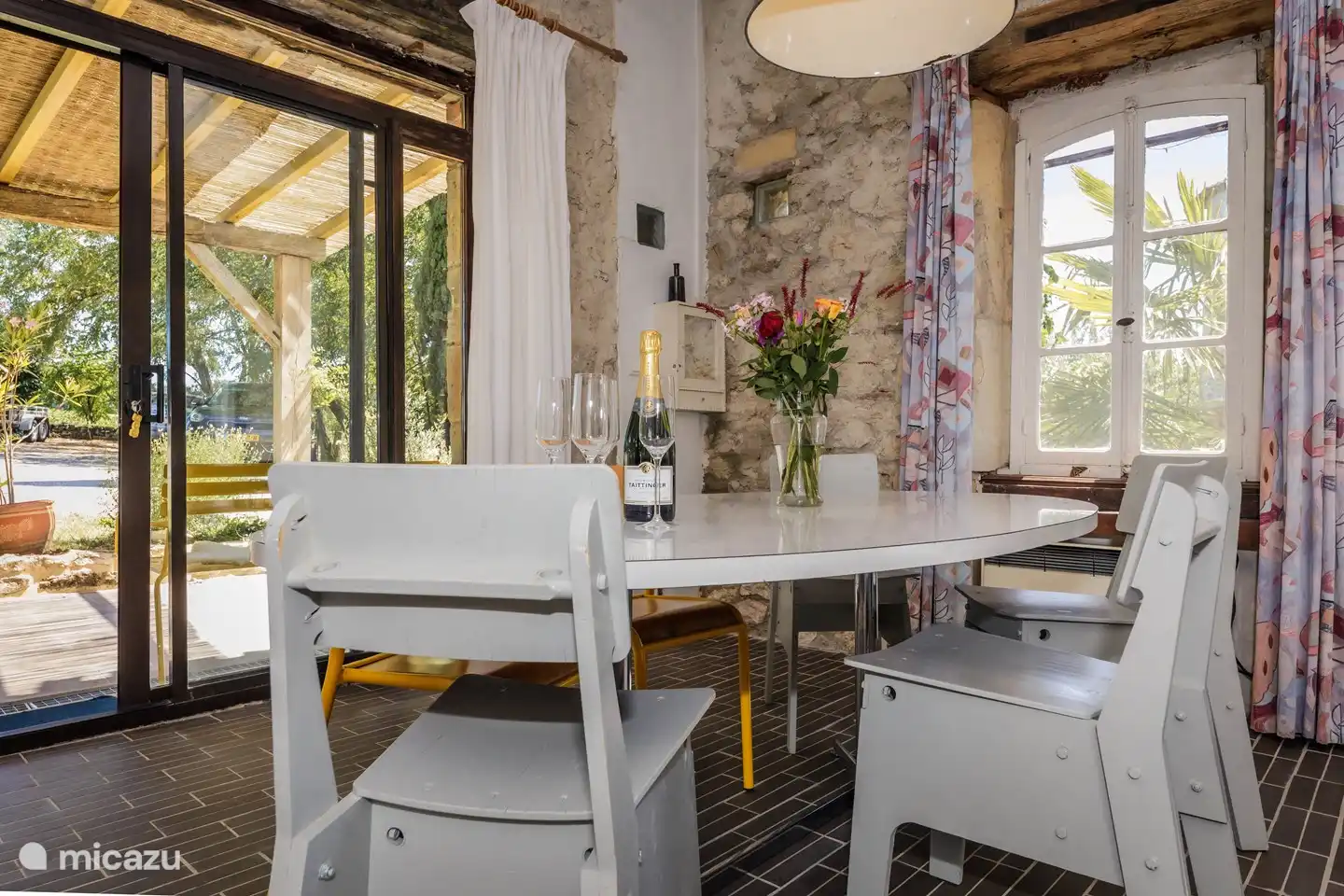 La Loge seating area with a view of the side terrace