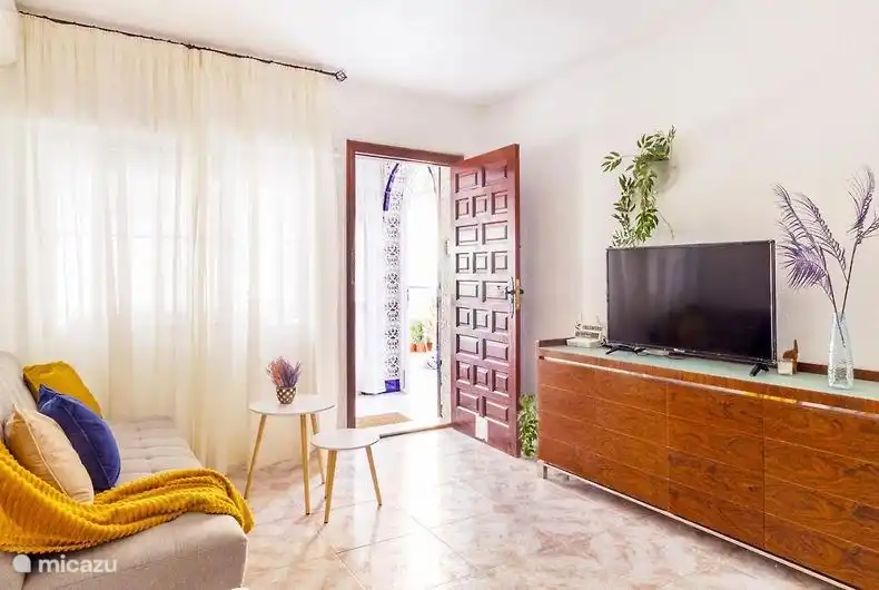 Spacious living room, with a new wide television with Chromecast. Also super fast, stable fiber optic internet connection!