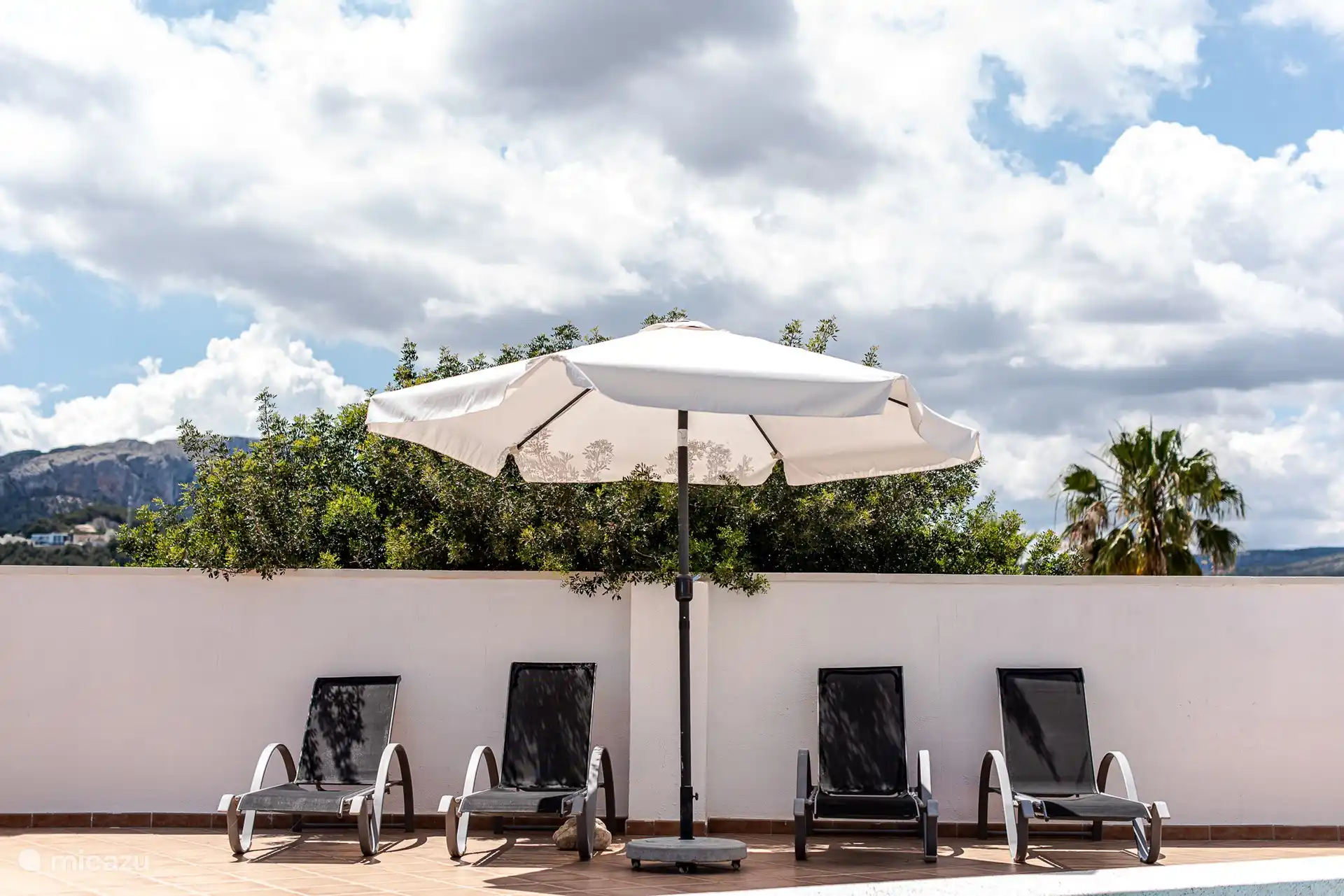sunbathing by the pool