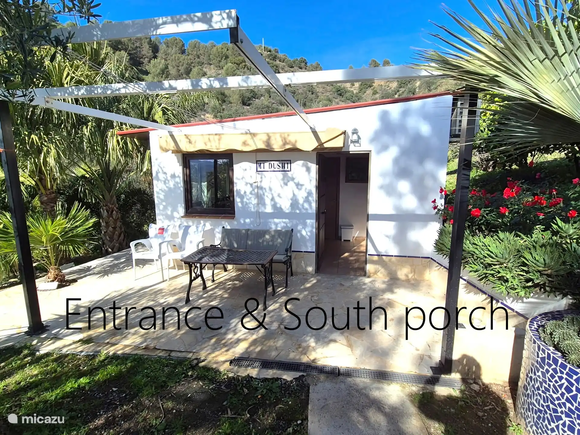 Entrada y porche en el sur