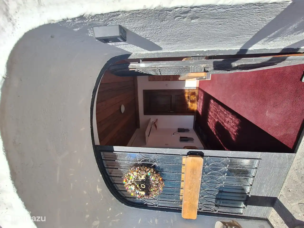 La entrada de la lata alpina FeWo Hauser 1 dice bienvenida