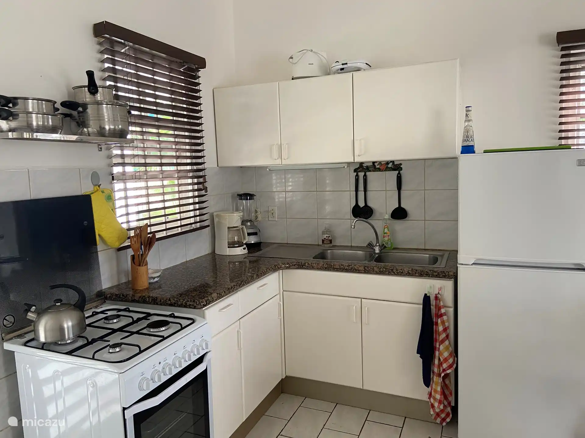 La cocina con todas las facilidades para cocinar tú mismo.