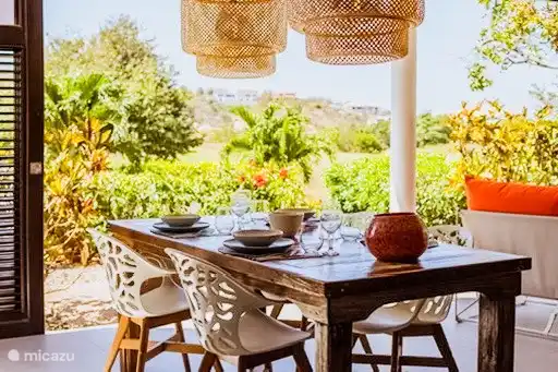 Lovely dining table with a view of the golf course