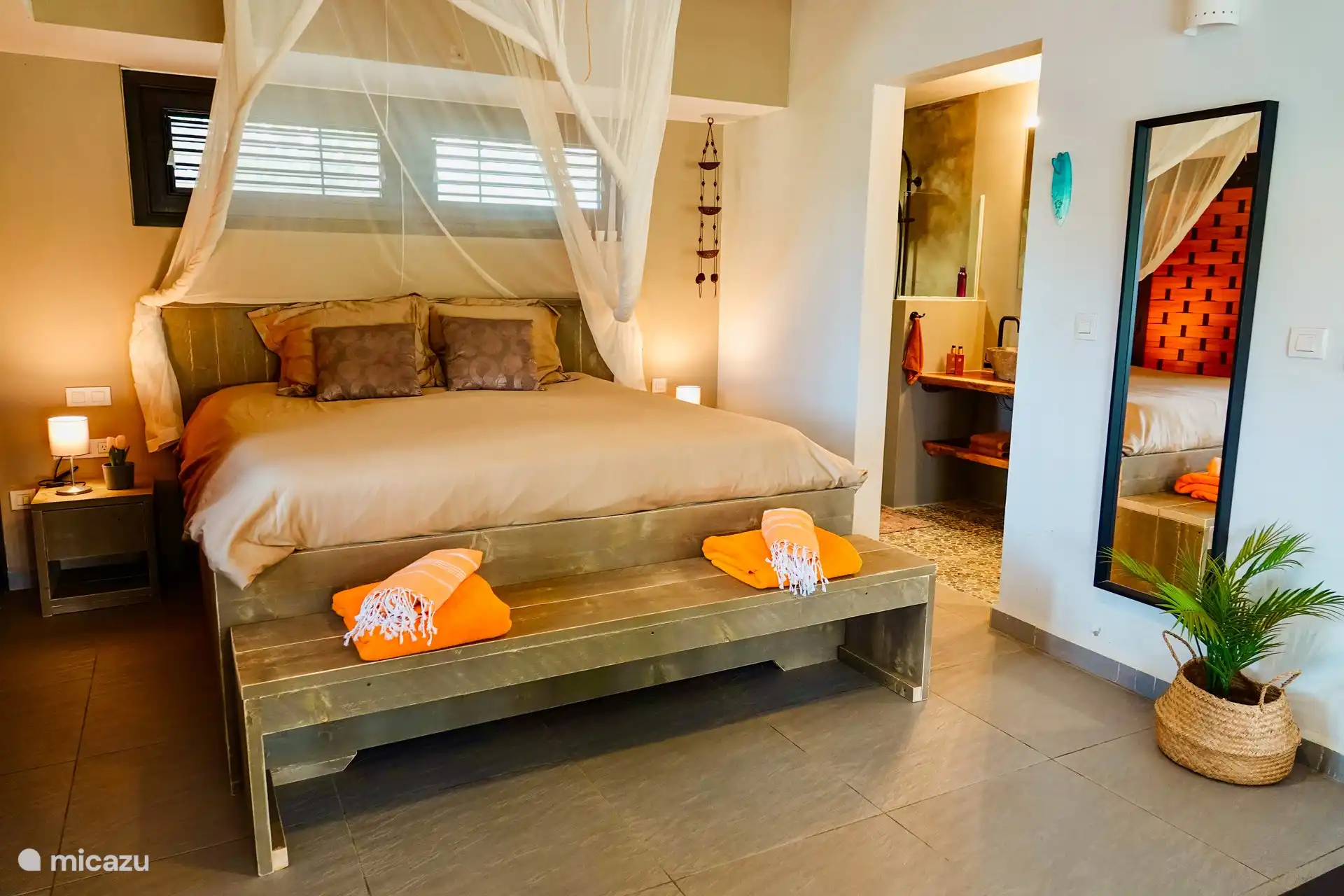 Spacious bedroom with king size bed and private bathroom