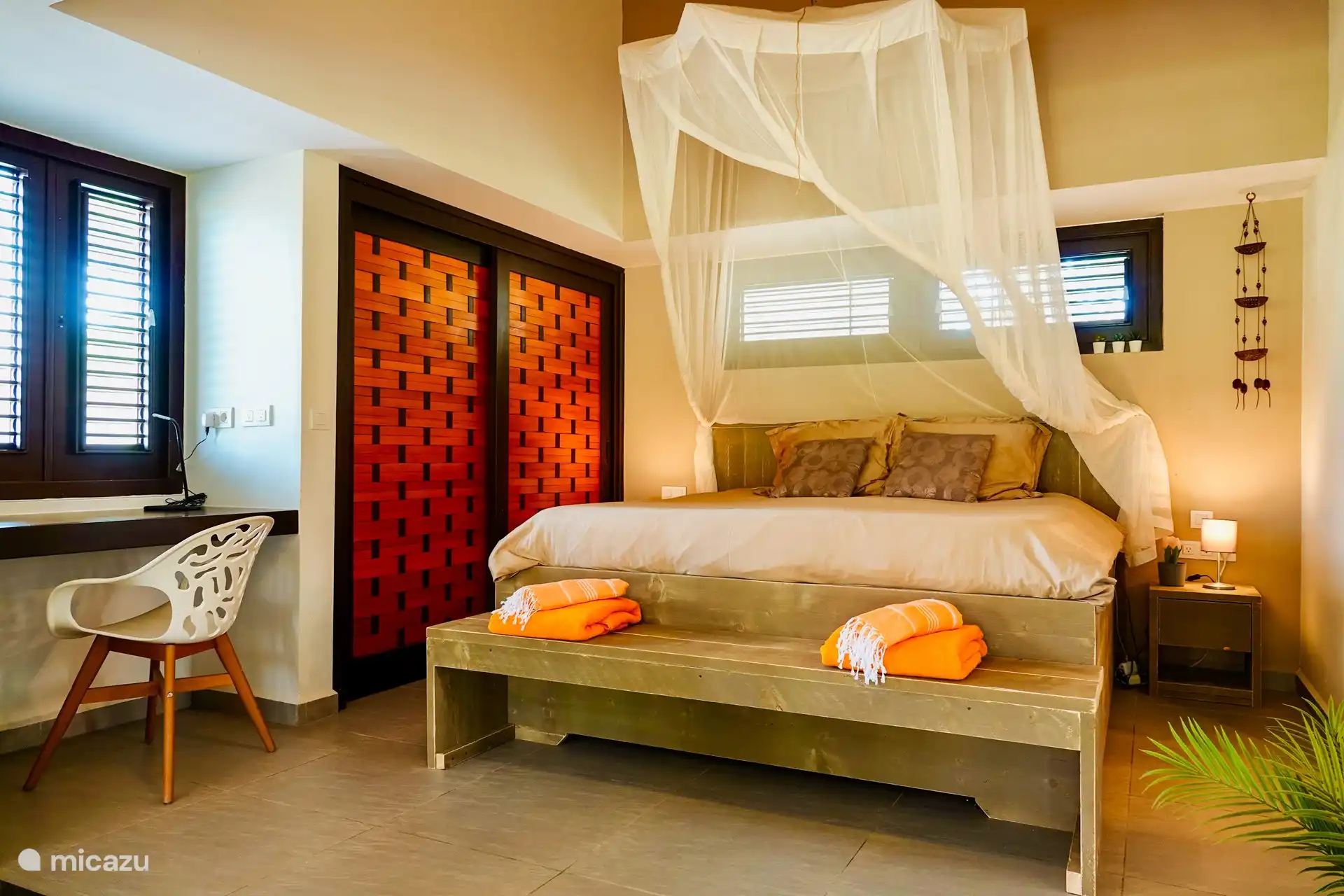 Spacious bedroom with king size bed and private bathroom