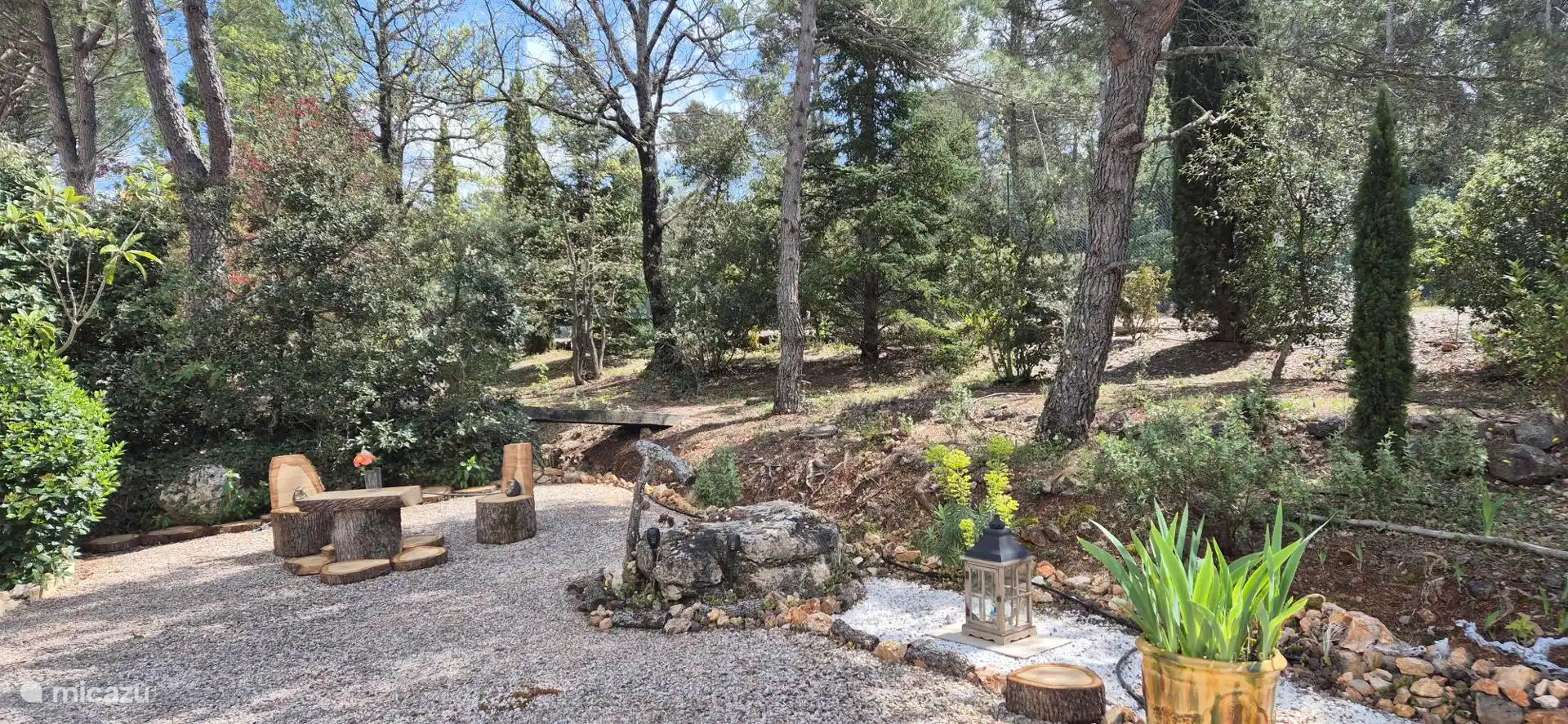 our new outdoor living room in the garden with a view of the surrounding trees
