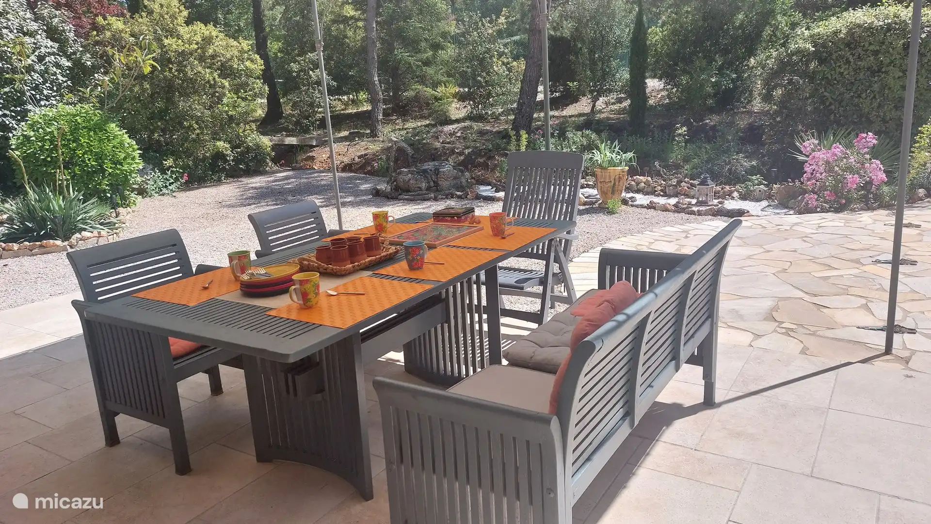 Covered, large terrace with a view of the garden, beautiful trees... and of course also on the pool