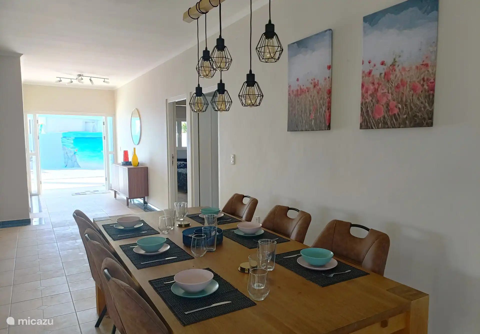 Dining table inside towards the garden.