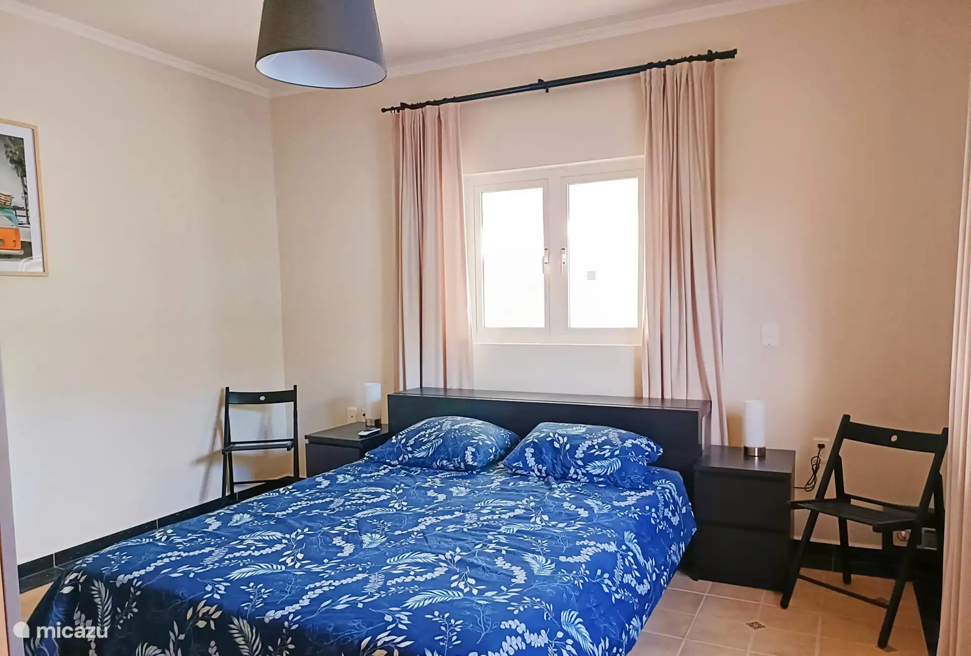 Master Bedroom with double bed. View of the Porch