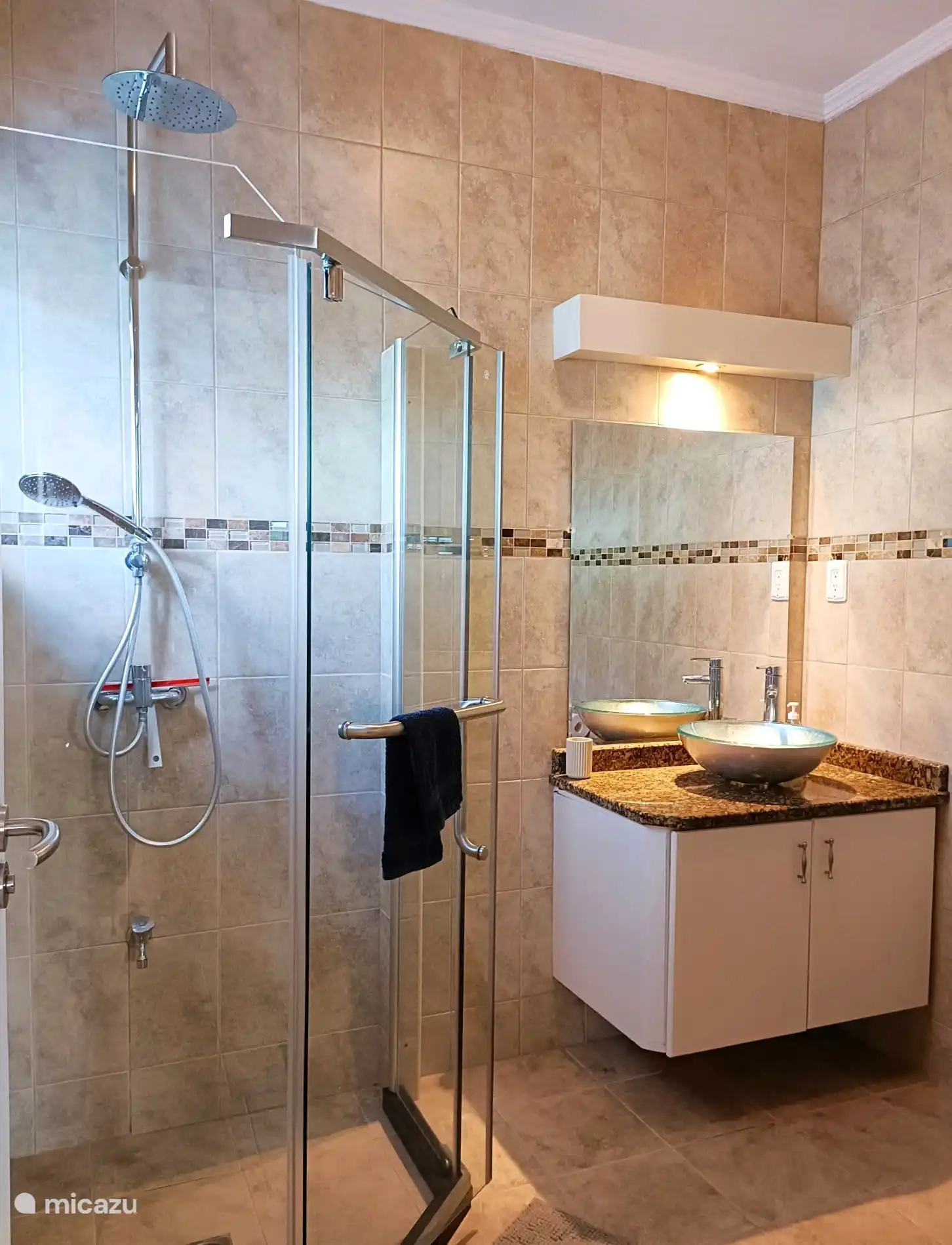 Bathroom for the Master Bedroom. Equipped with (rain) shower (with hot water), hanging toilet, bathroom furniture.