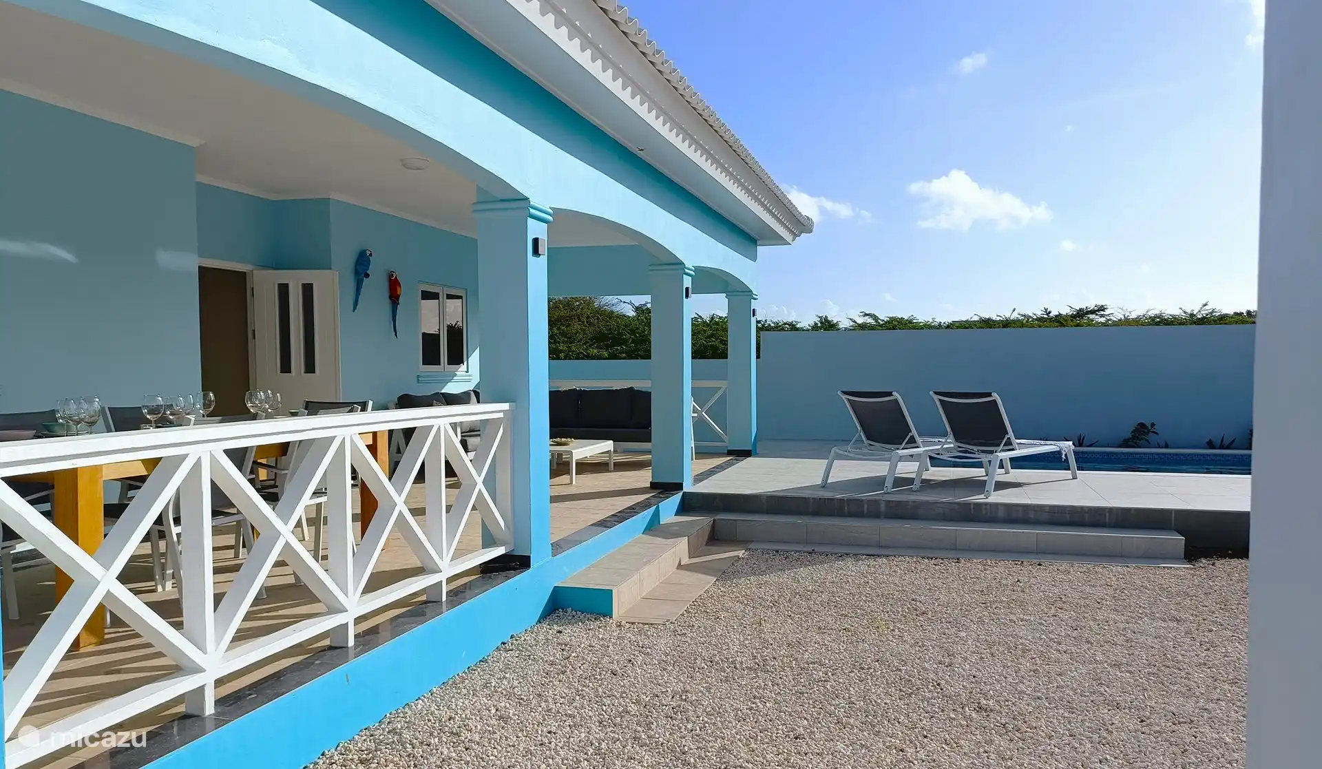 Backyard/terrace. From the lounge area it is level with the pool deck.