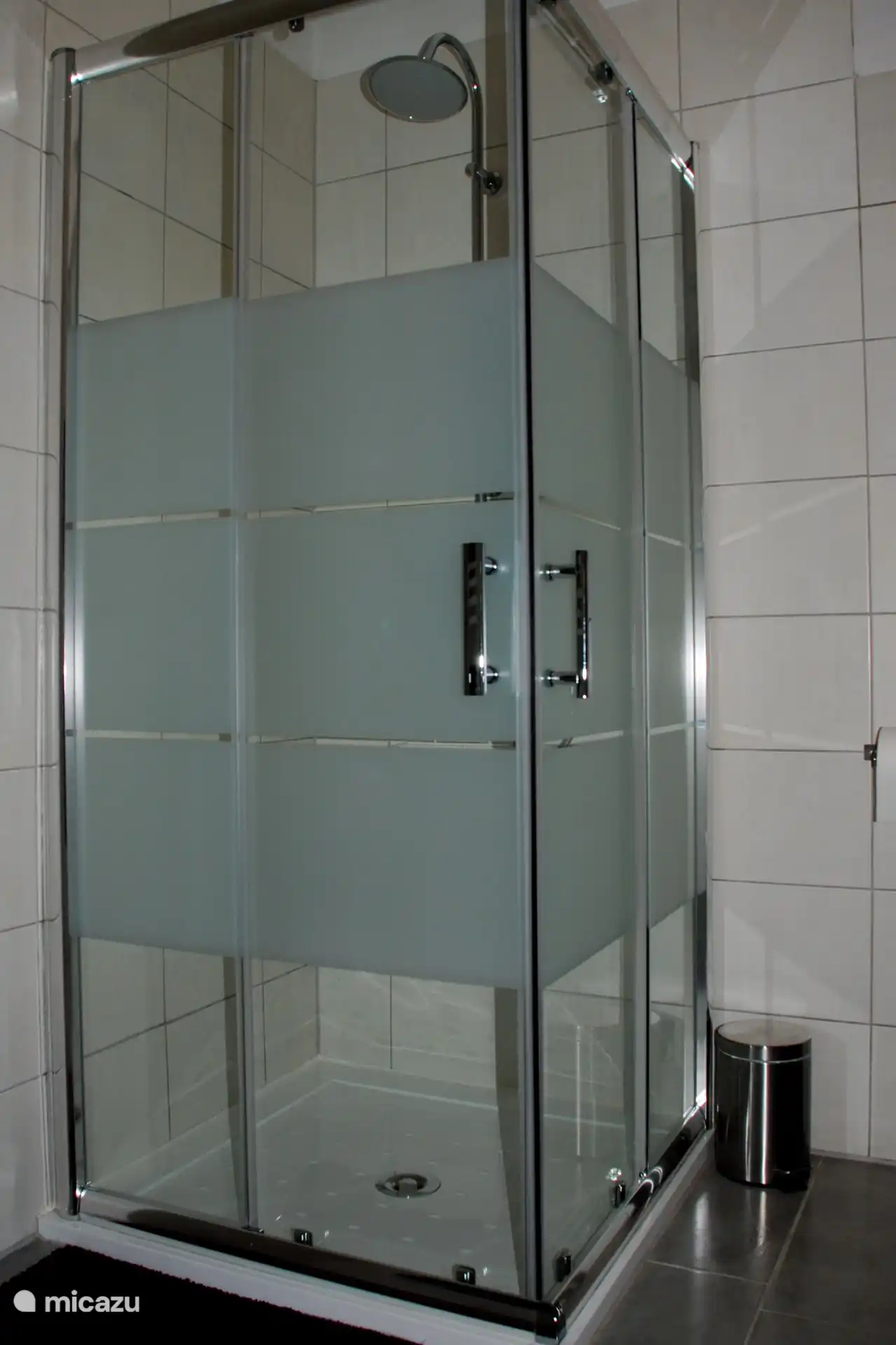 Bathroom with shower, sink and toilet