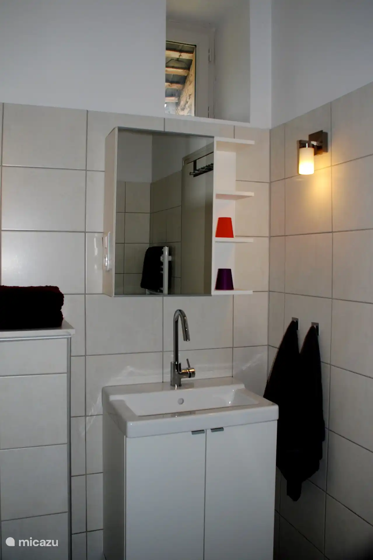 Bathroom with shower, sink and toilet