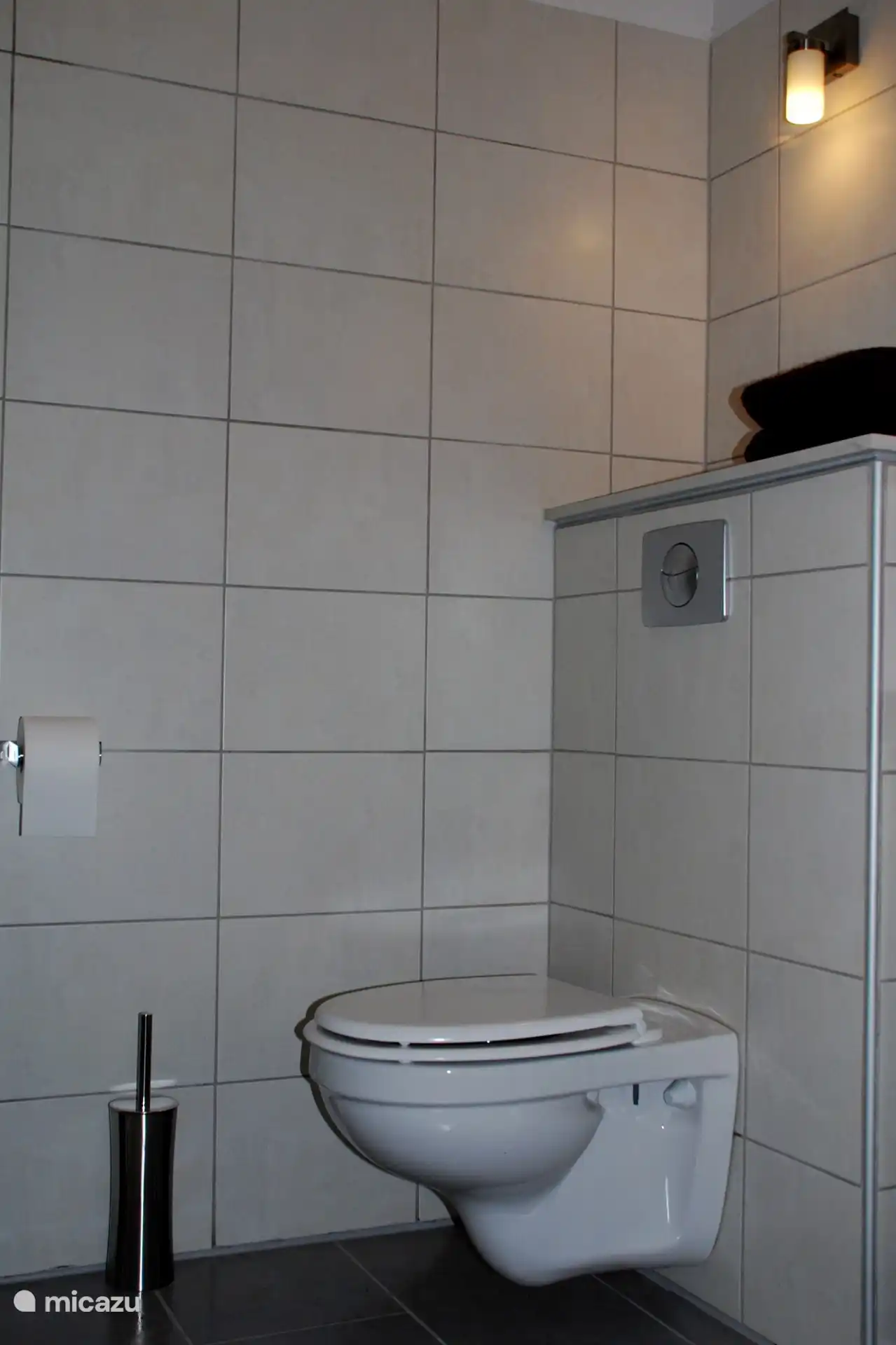 Bathroom with shower, sink and toilet