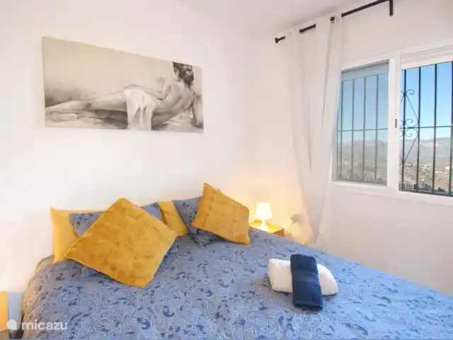 Casa Kambó en España, Costa del Sol, Comares - villa Vista y acceso a su propia terraza privada.