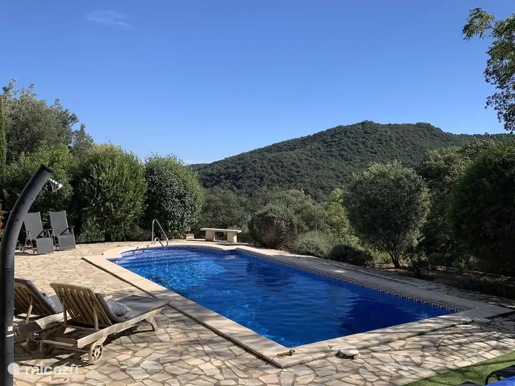 Enjoy the peace and quiet and the view by the pool 