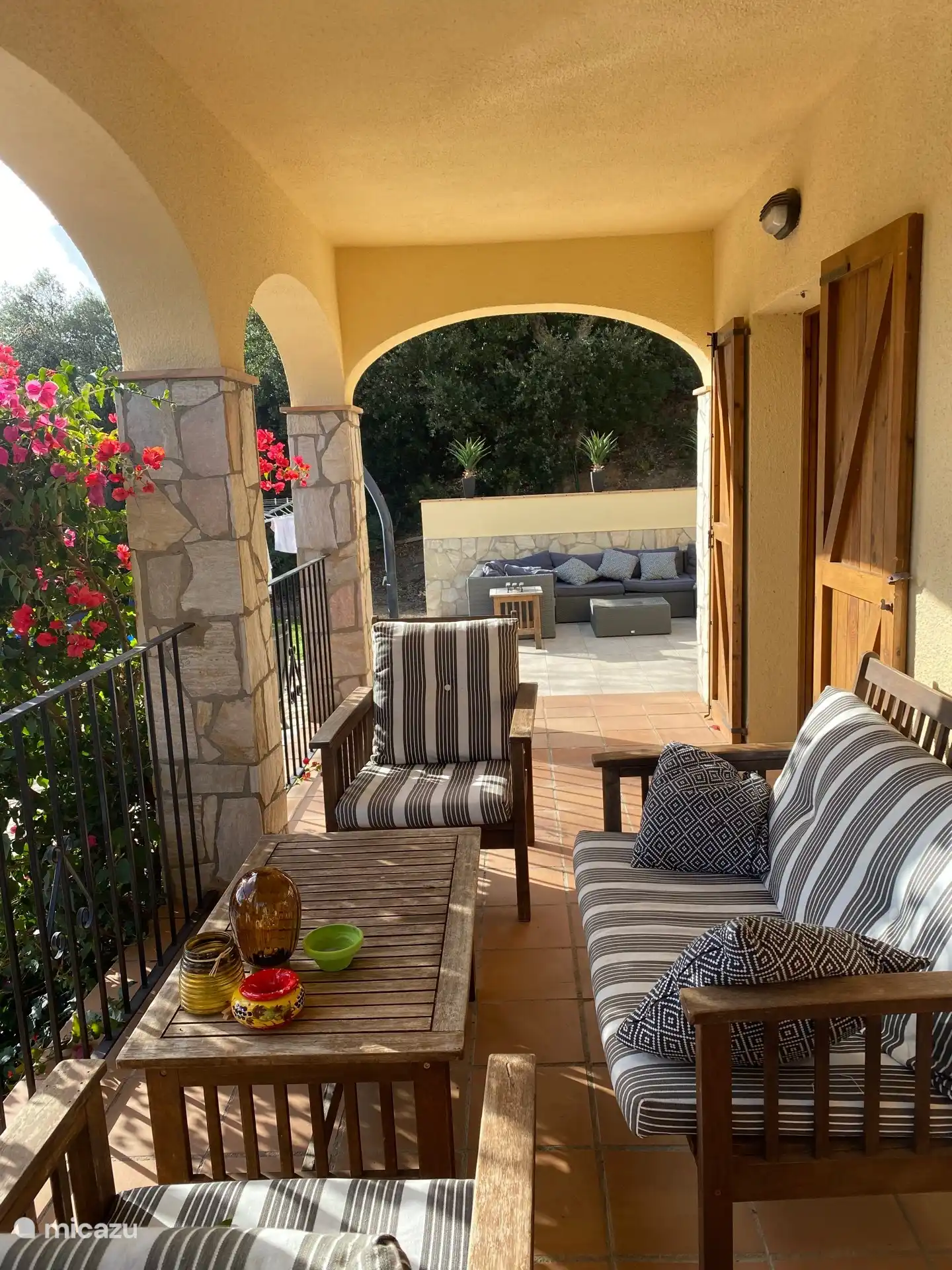 View from the cozy little terrace at the front of the house to the large terrace
