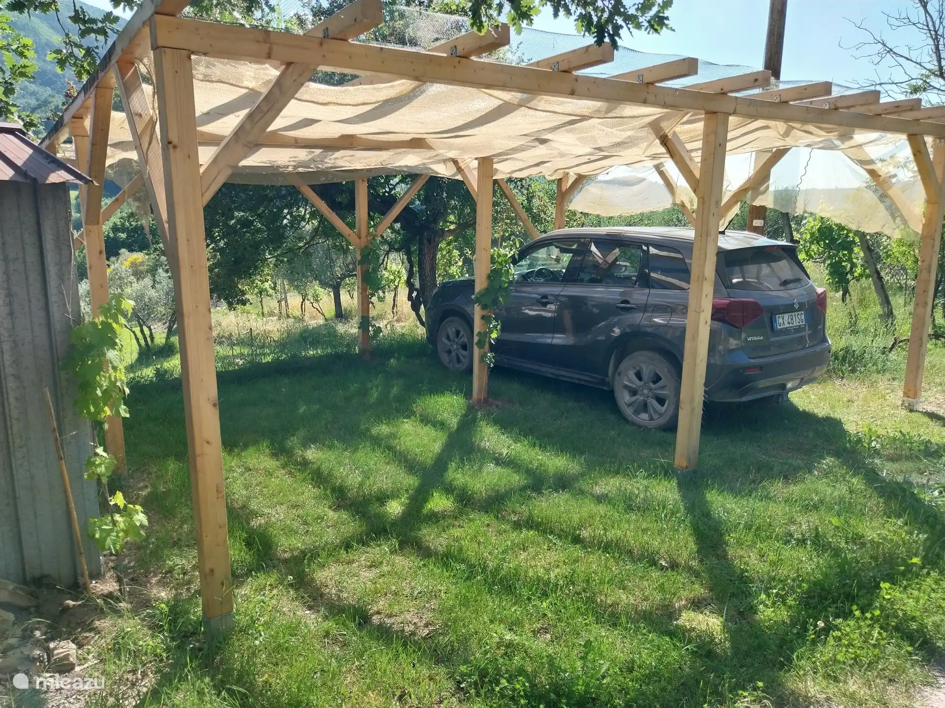 Shaded private parking for guests.