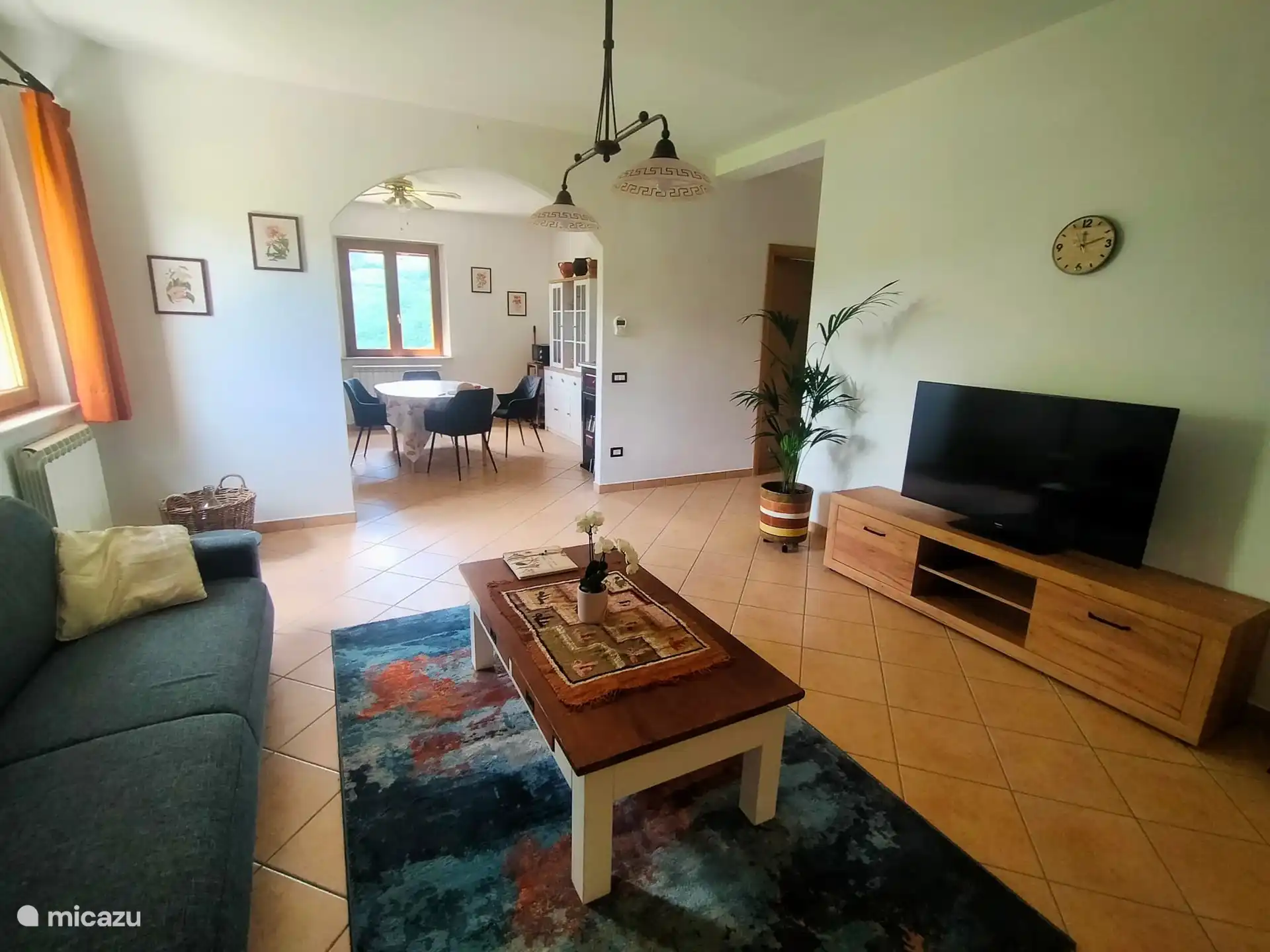 The living room with sitting area and with a view to the kitchen.