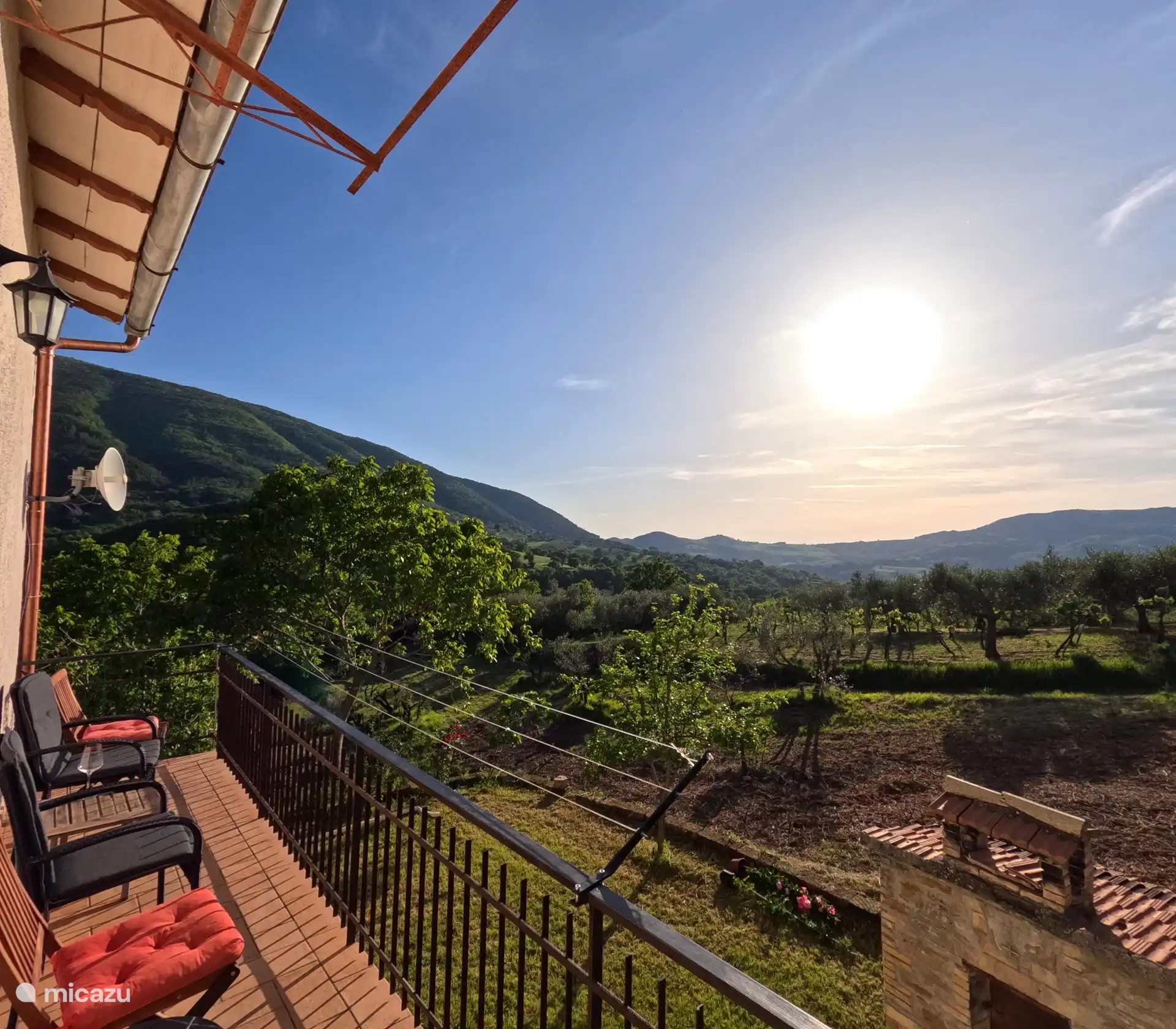 Looking over the mountains towards Assisi from your own balcony.
