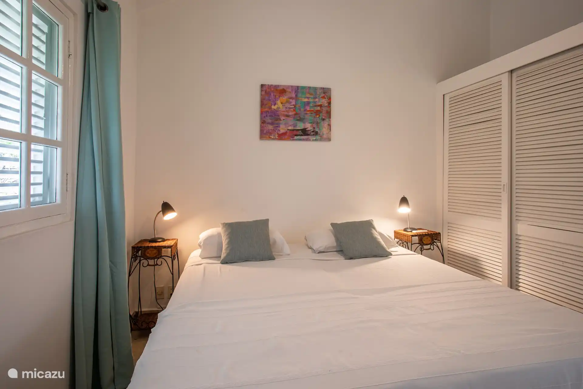 Schlafzimmer 3 mit Klimaanlage und Gemeinschaftsbad