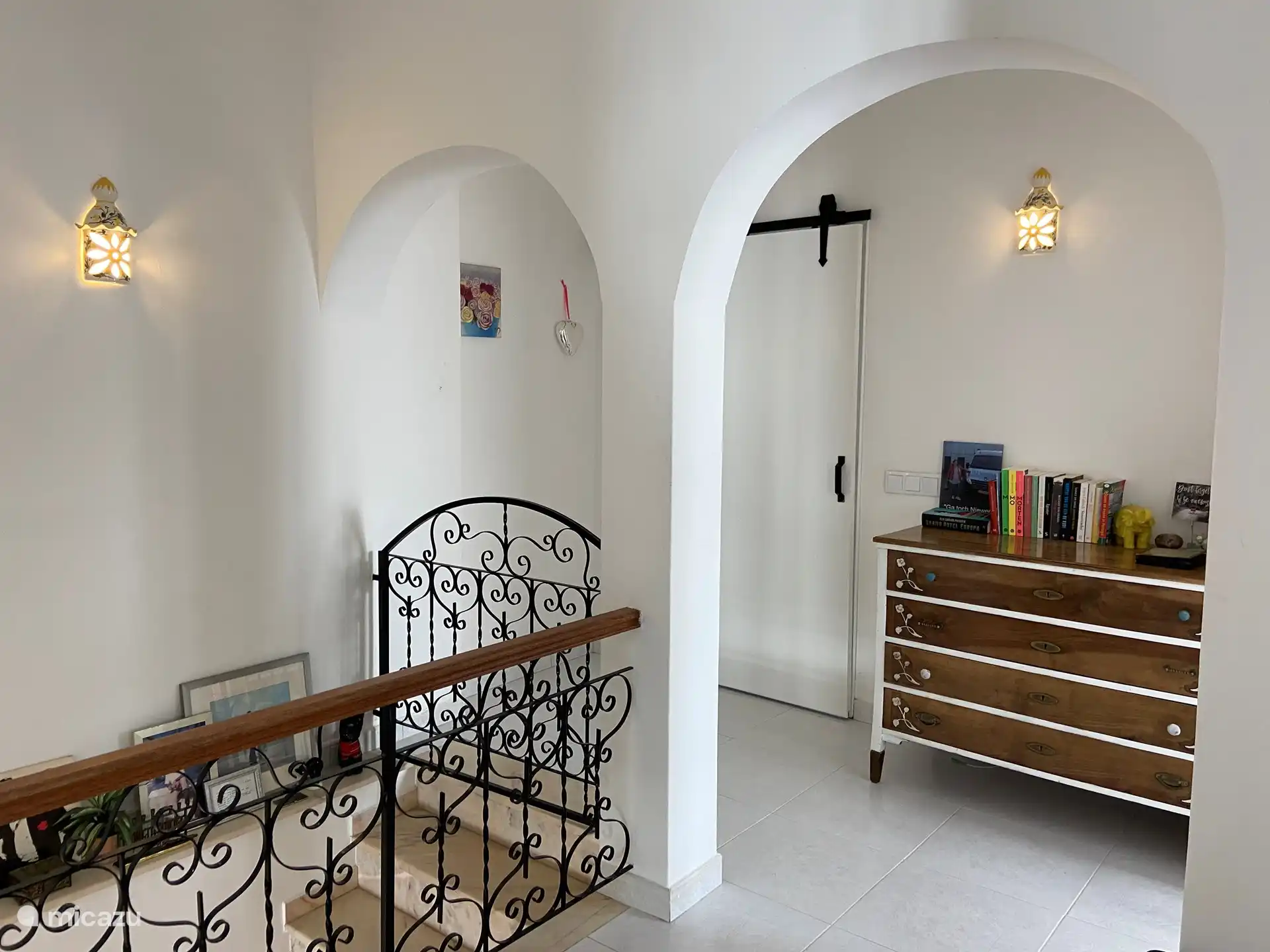 The hall with the bathroom straight ahead