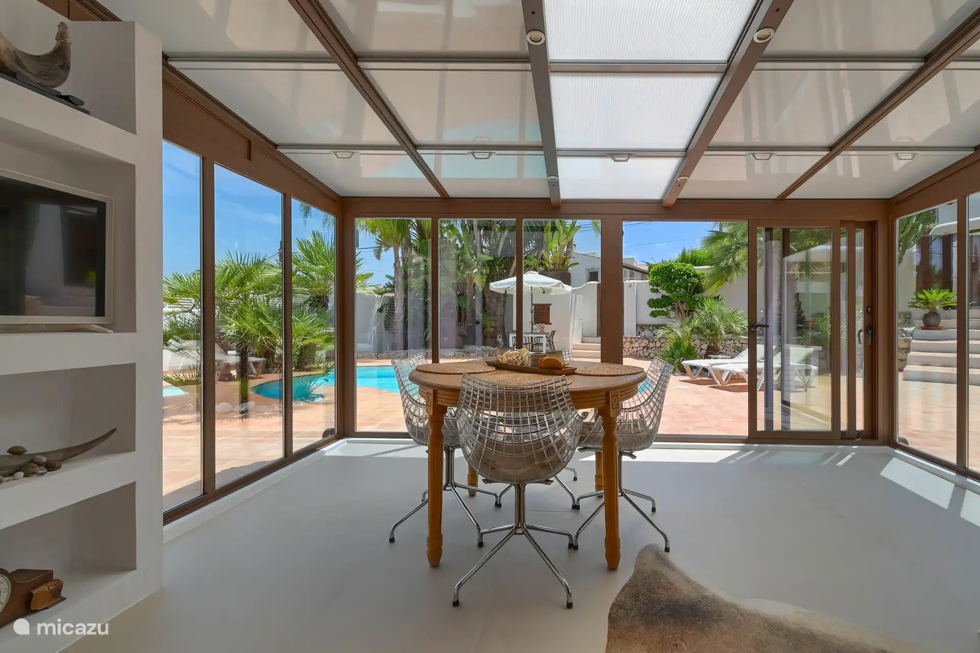 casa ZenZeZ Wintergarten mit Gartenblick