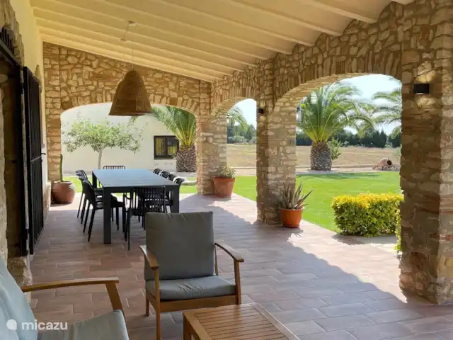 vakantiehuis huren in Spanje, Catalonië, L'Ampolla – Toren Veranda met tafel voor 10 personen en zithoek