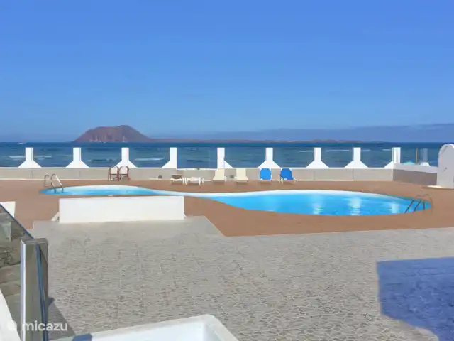 The Beach House (nouvelle inscription) | Espagne, Fuerteventura, Corralejo - maison de vacances Grande piscine commune souvent très calme.