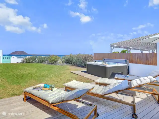 The Beach House (nouvelle inscription) | Espagne, Fuerteventura, Corralejo - maison de vacances Profitez d'un bain de soleil avec vue sur la mer et sur les nombreux amateurs de sports nautiques travaillant à votre porte.