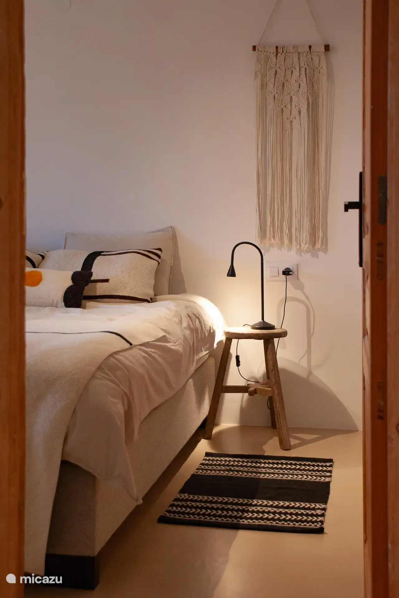 Tweede slaapkamer met tweepersoonsbed en airco.