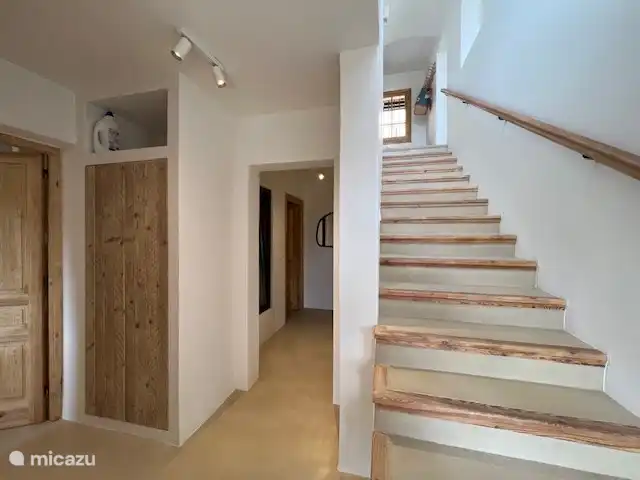 Bedrooms are downstairs, in the closet there is a washing machine and dryer