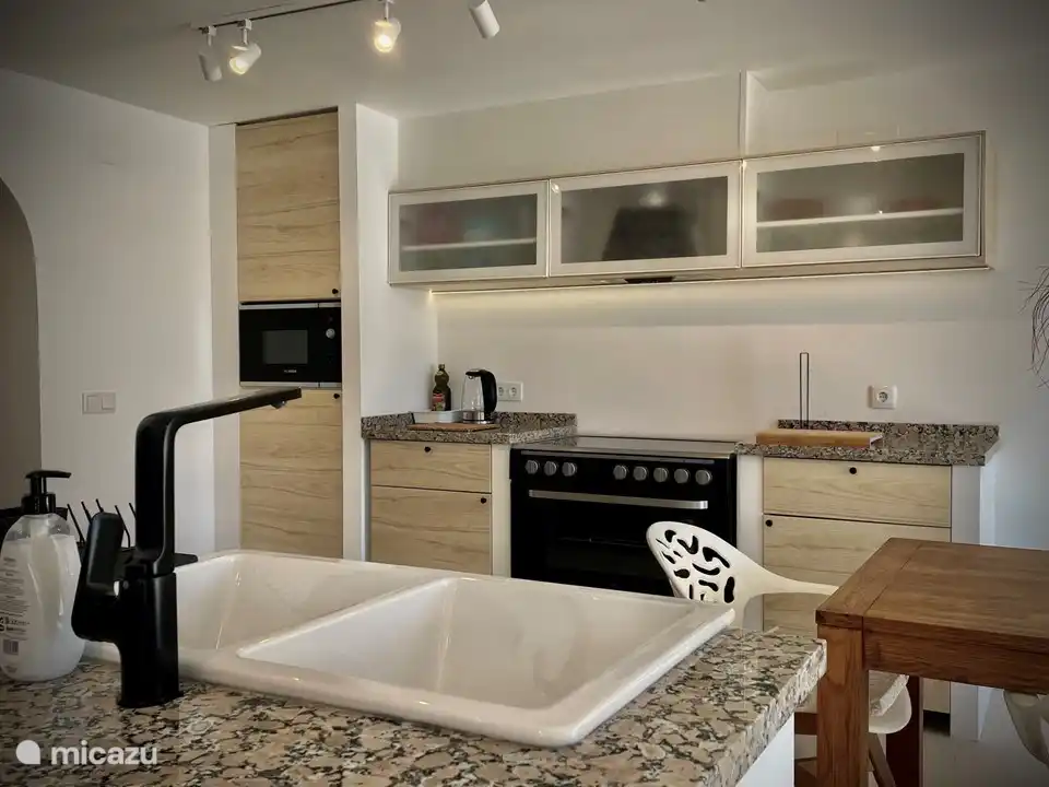 amplias cocinas con todos los lujos