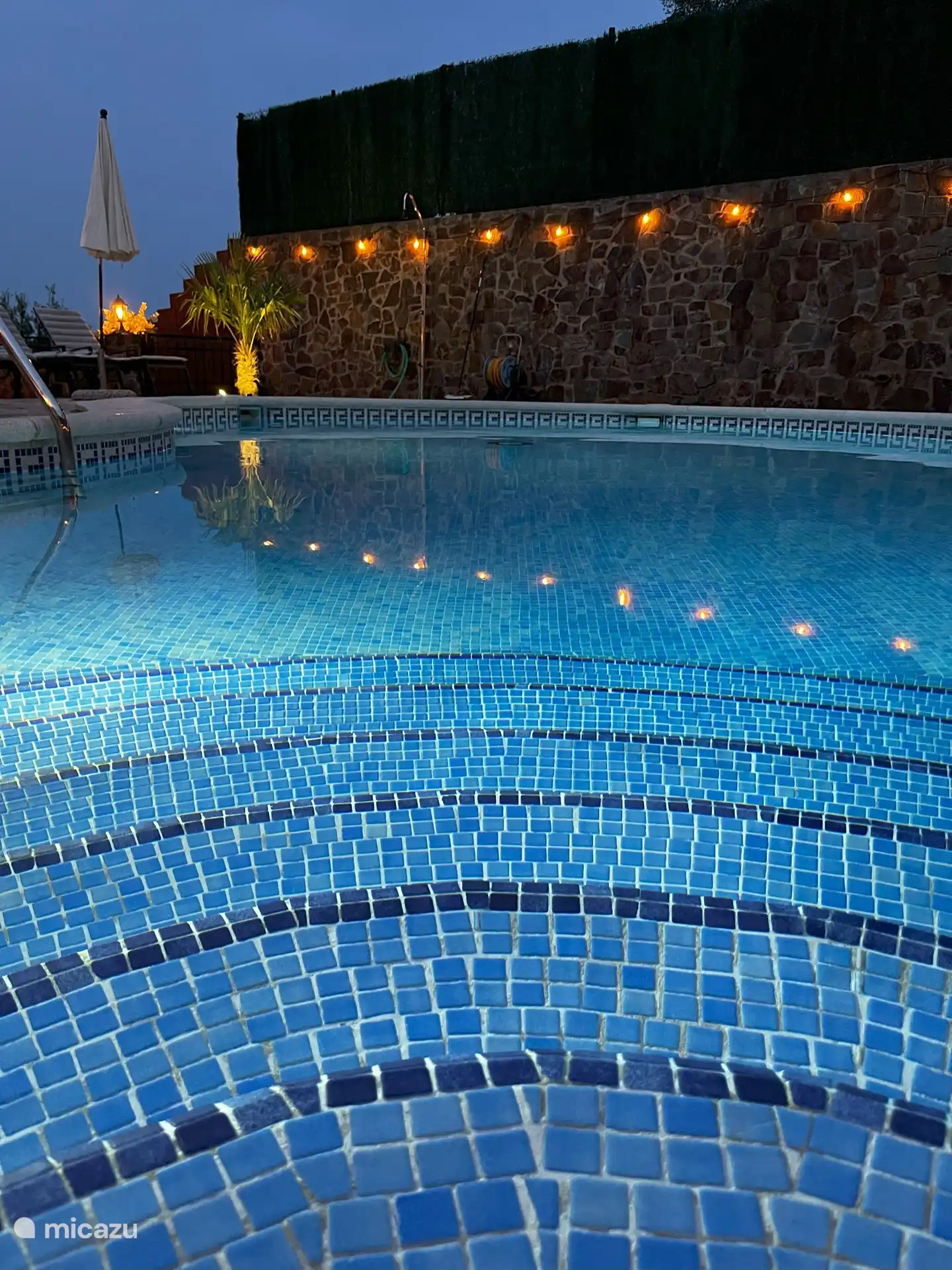 in the evening by the saltwater pool