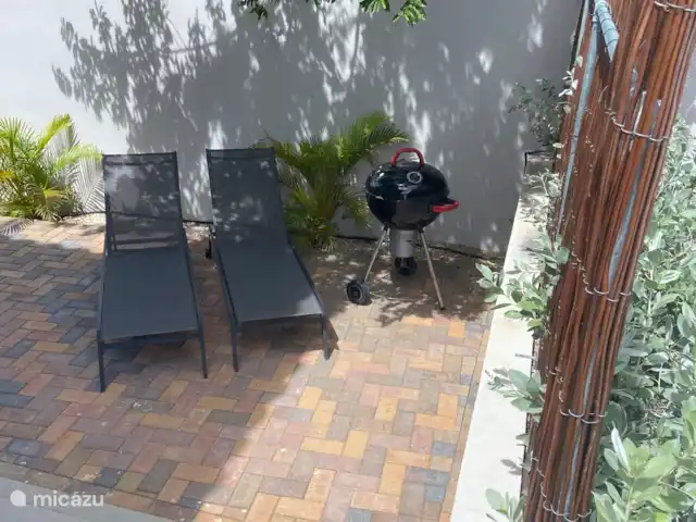 Location de Vacances Curaçao, Banda Ariba (est), Jan Thiel, appartement - Curalux Apartments-Flamingo De jolis transats