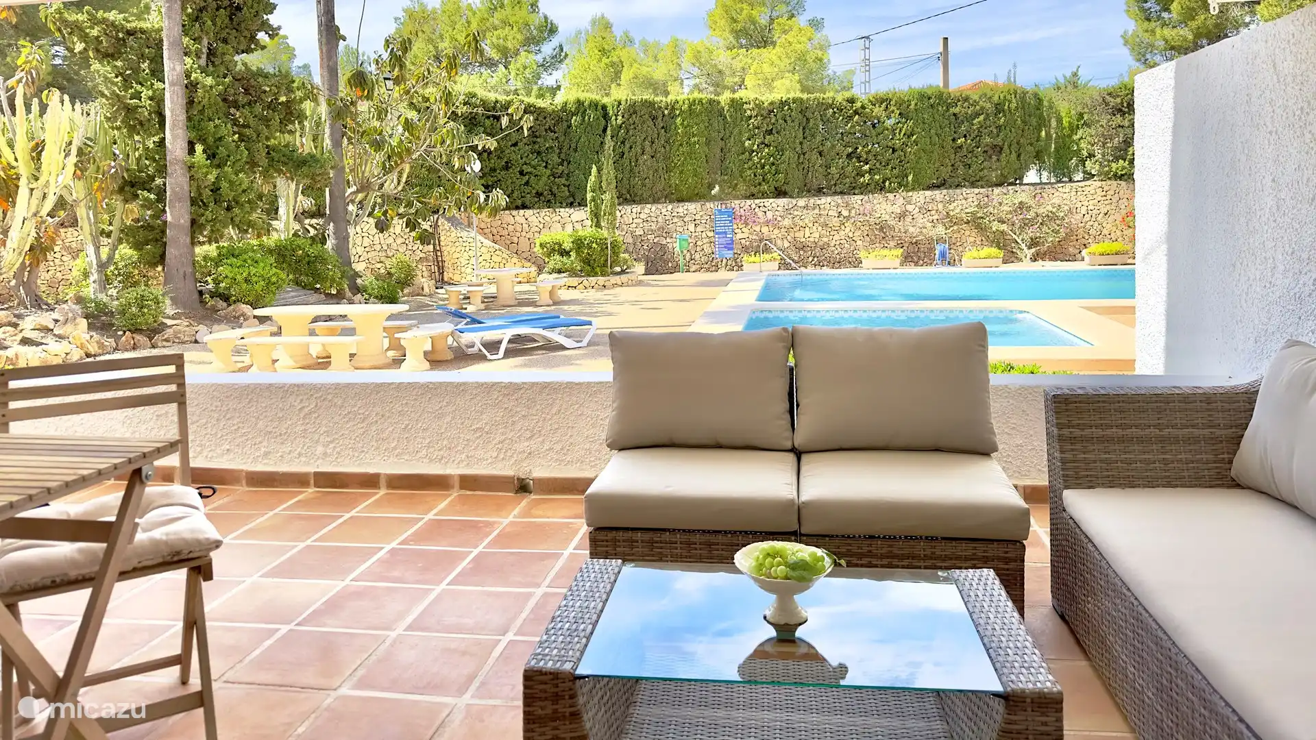 Spacious terrace with seating for 4 people