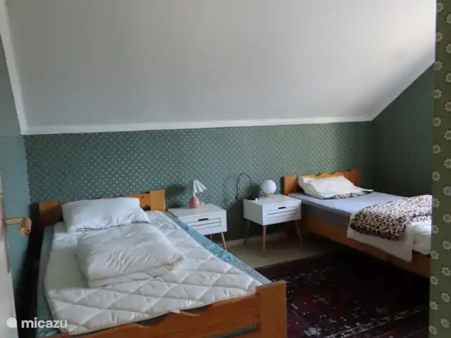 Älvsjö Anderssons en Suecia, Värmland, Lesjöfors - casa vacacional Dormitorio 3 en el 1er piso. Aquí hay dos camas individuales.